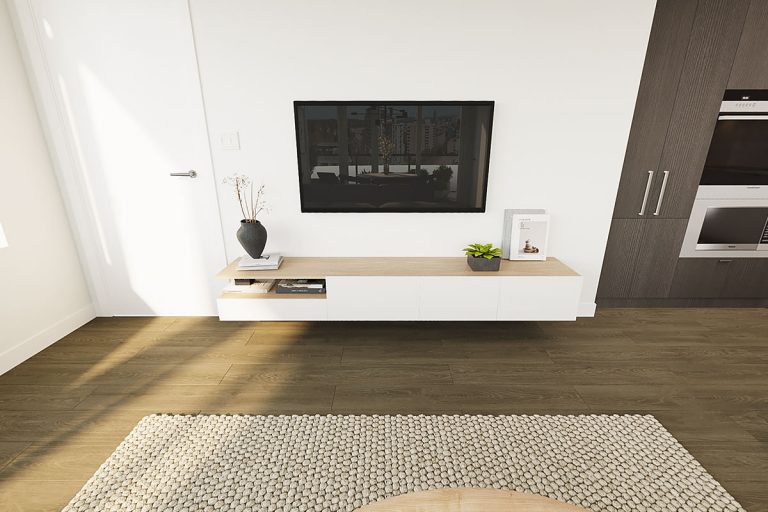 A flat-screen TV sits above a wooden cabinet.