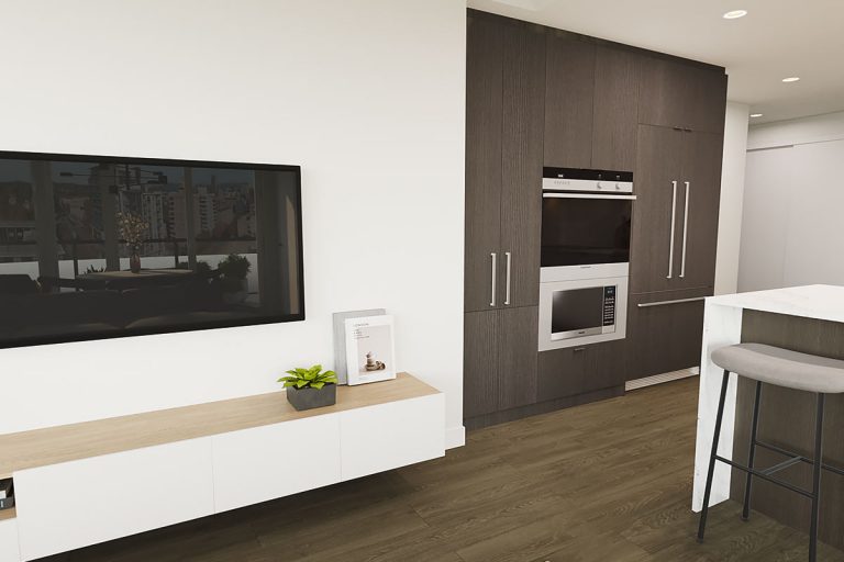 A flat-screen TV sits above some wooden cabinets next to the kitchen space.